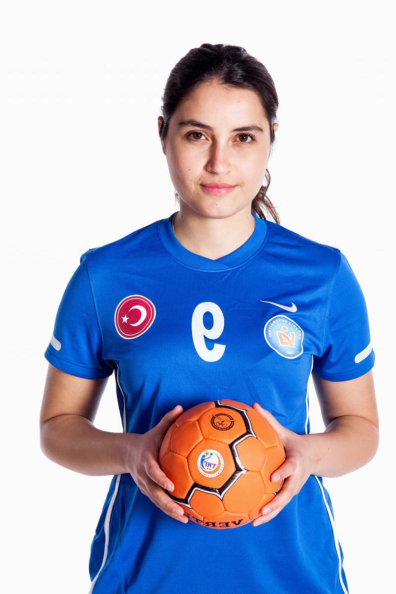 sphere woman wearing orange volleyball ball