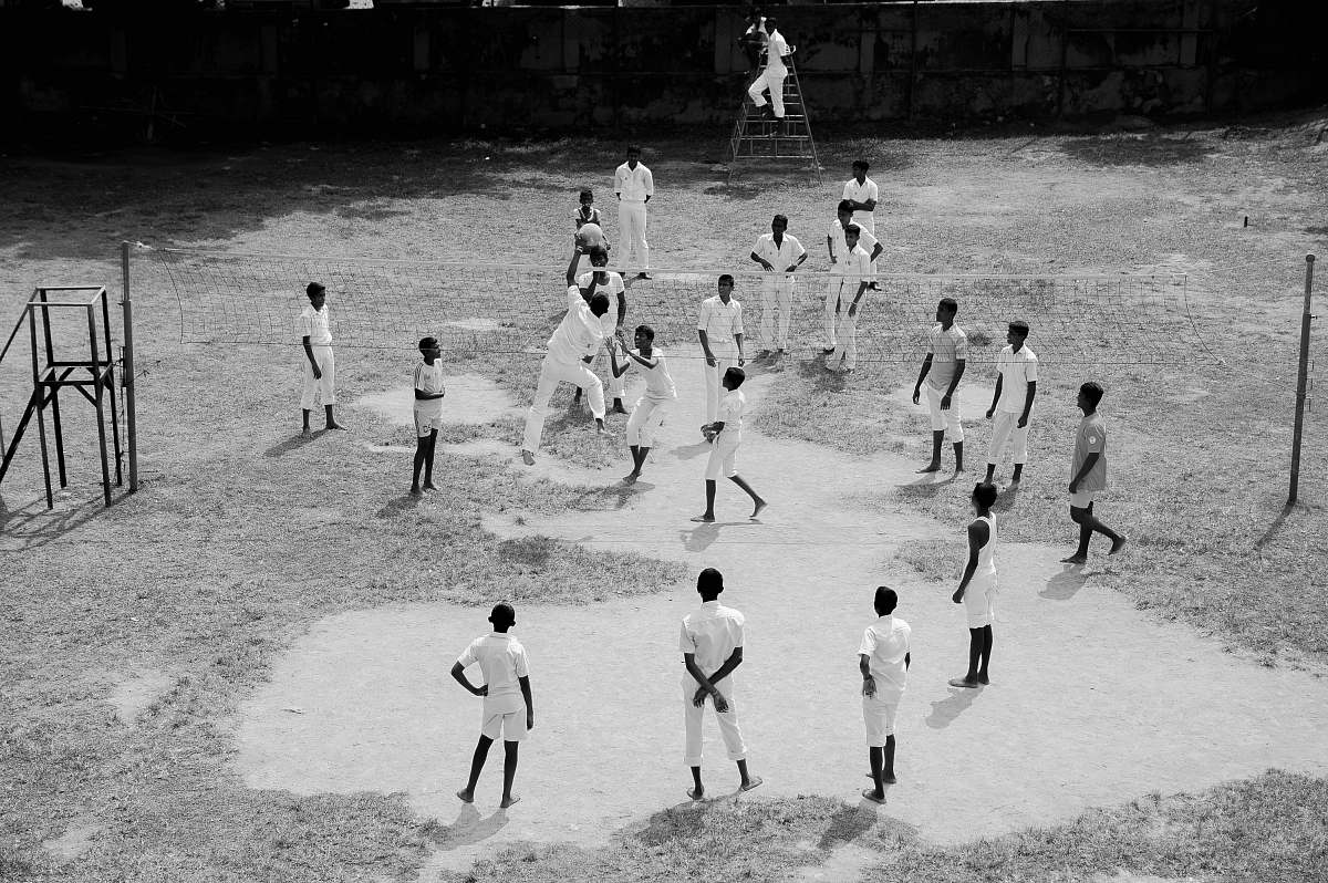 black-and-white group of people playing baseball chair