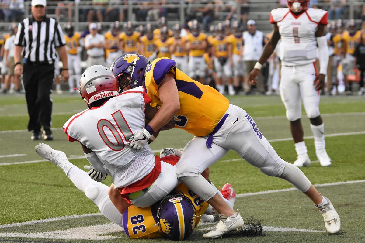 apparel football playing playing on field clothing