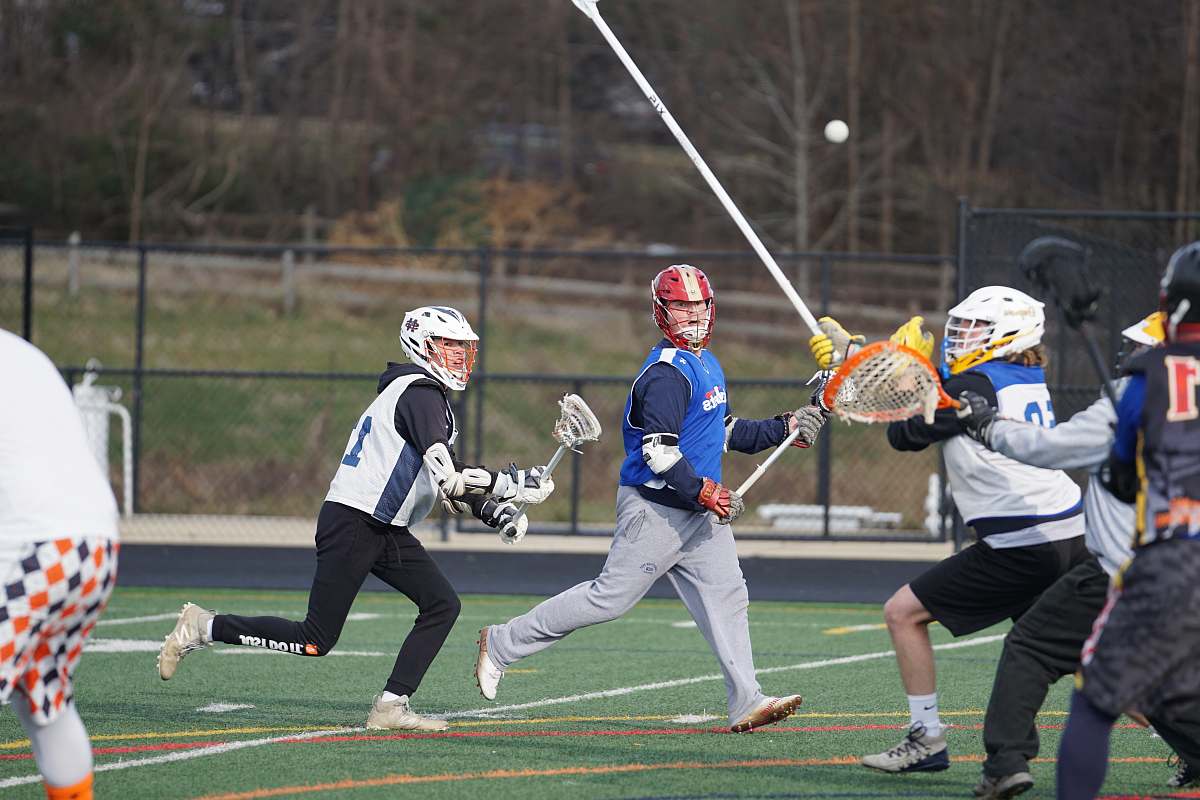 clothing men playing on field apparel