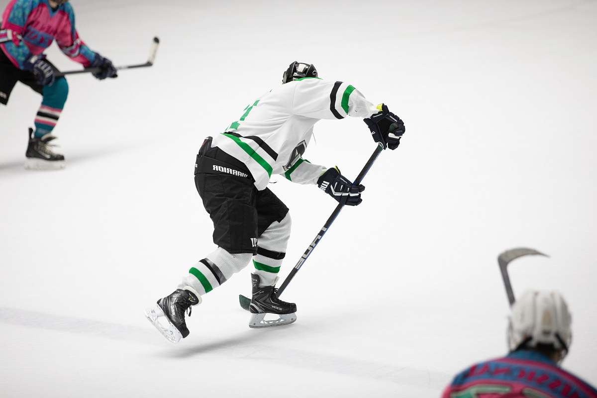 person men playing hockey human