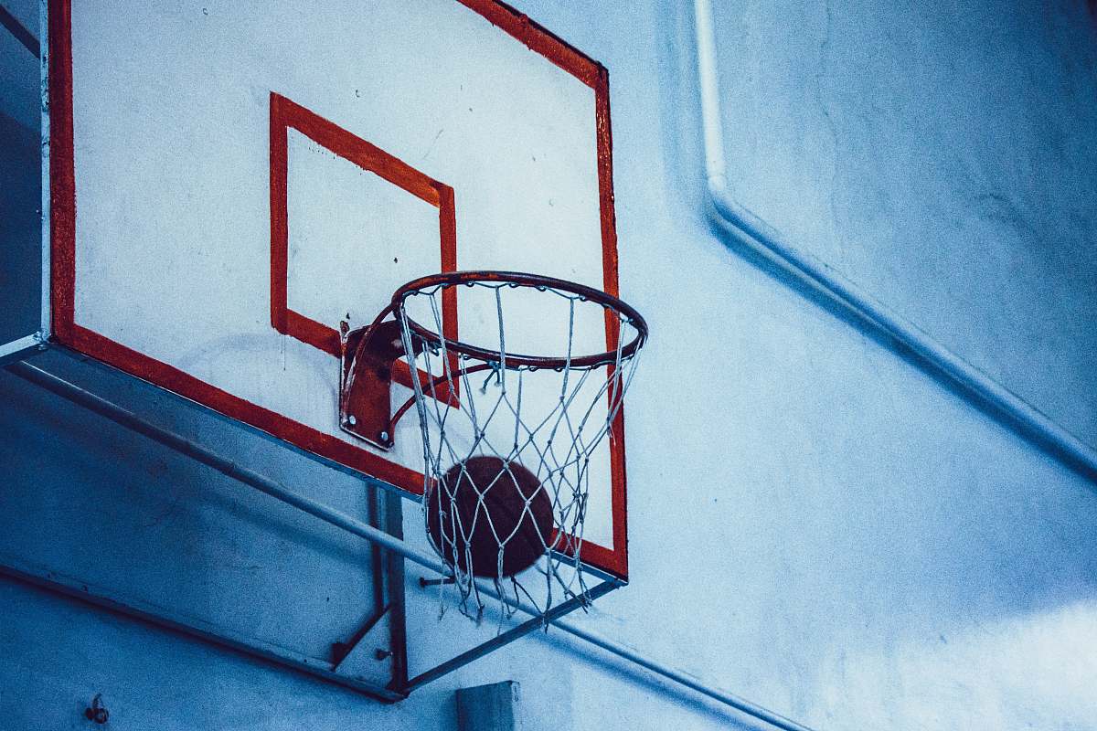 sport ball in basketball hoop sports