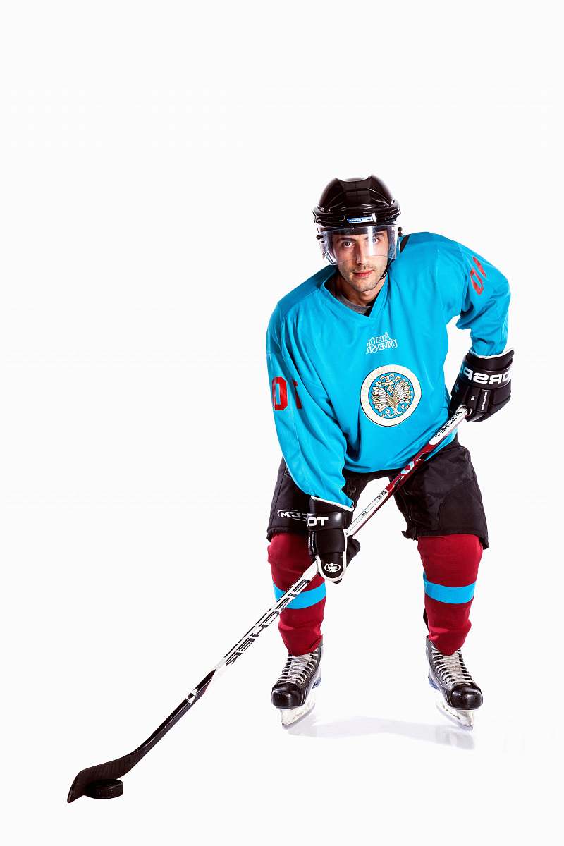person air hockey player holding stick apparel