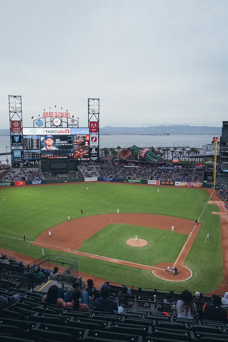 person baseball field building