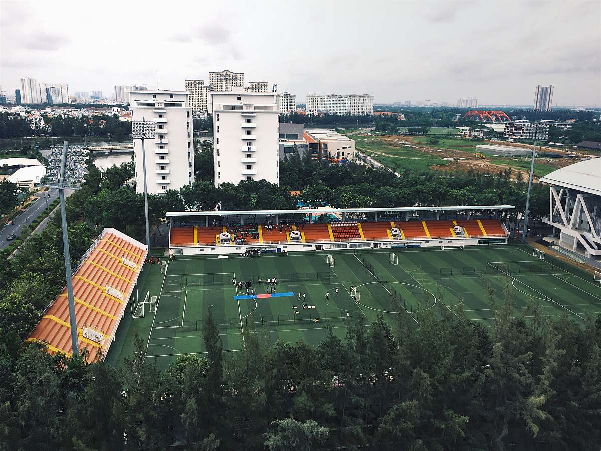people bird's eye view of a green football field field