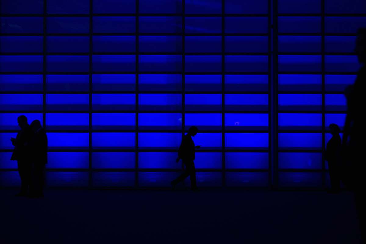 person black and white metal frame blue