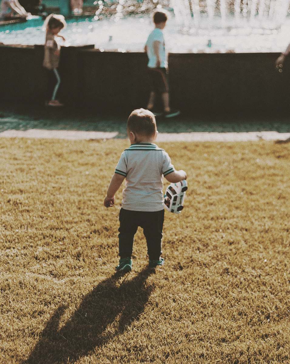 person boy wearing white shirt apparel