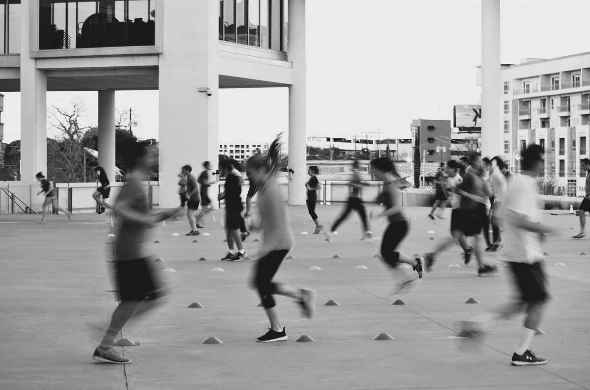 person grayscale photography of people at the park black-and-white