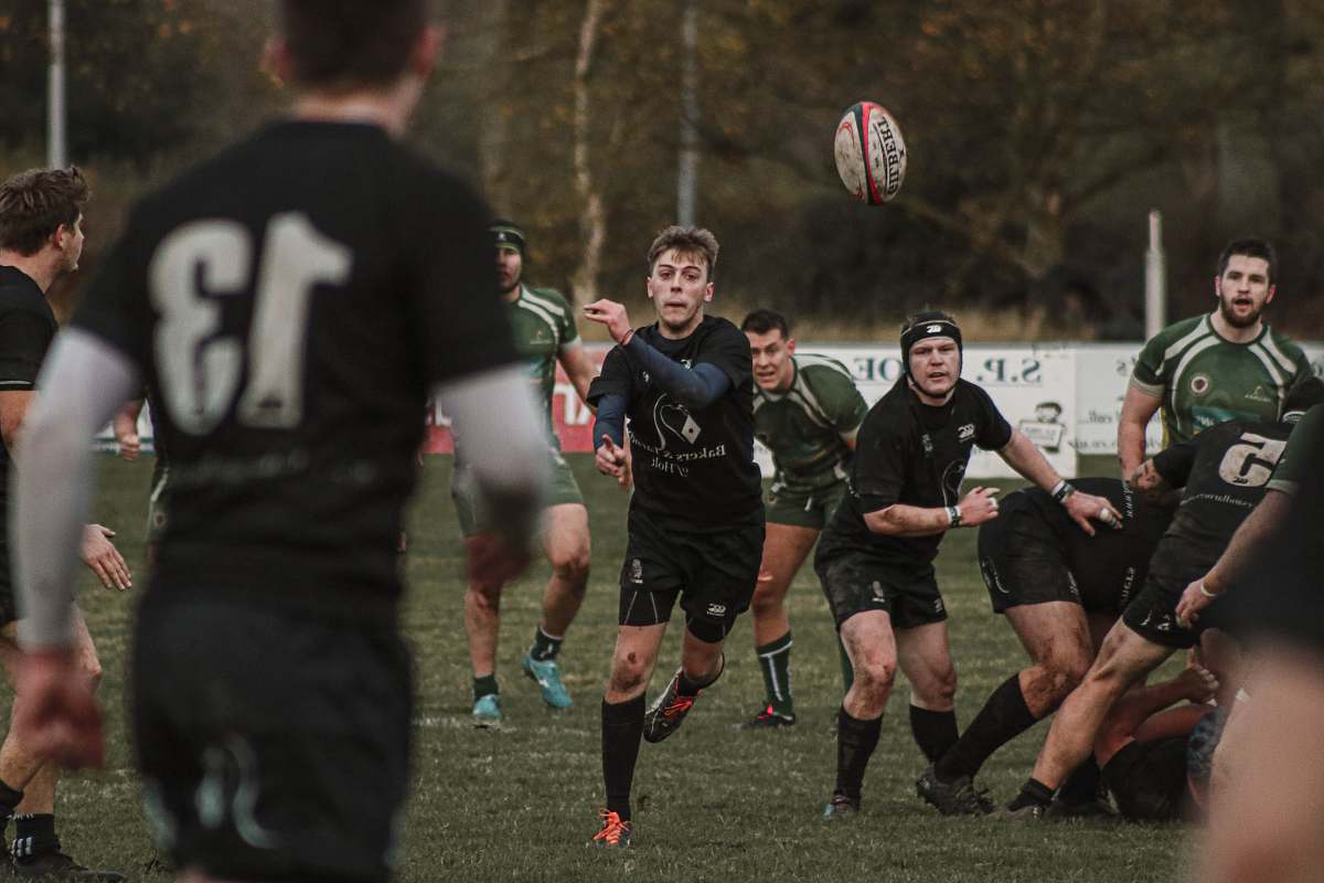 person group of men playing football sport