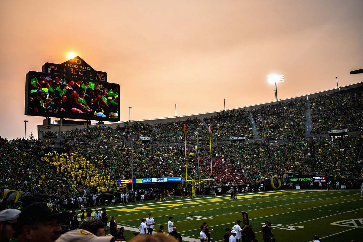 person group of people at football stadium crowd