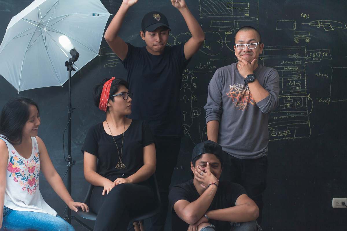 person group of people inside studious apparel