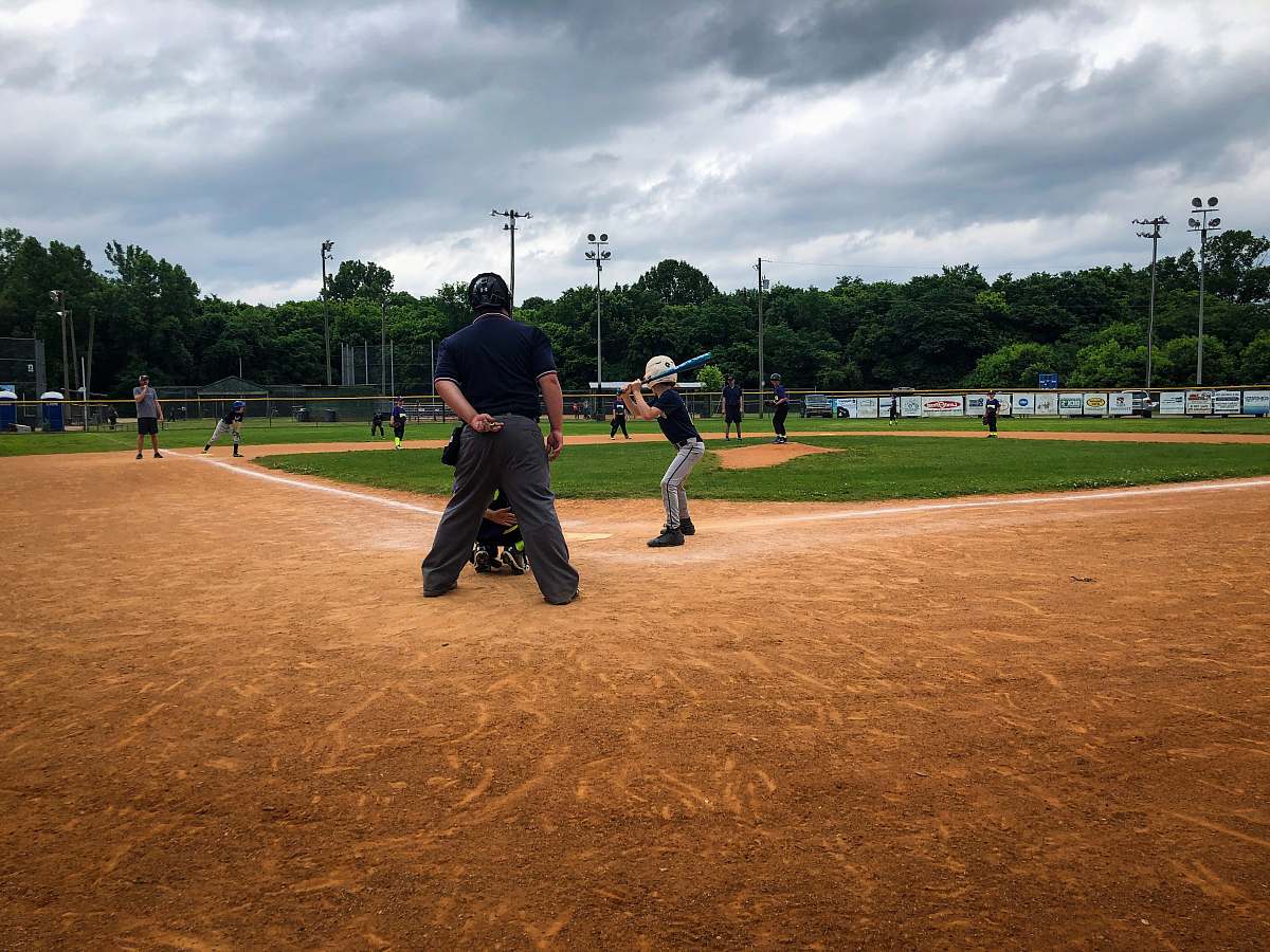 person group of person playing baseball people