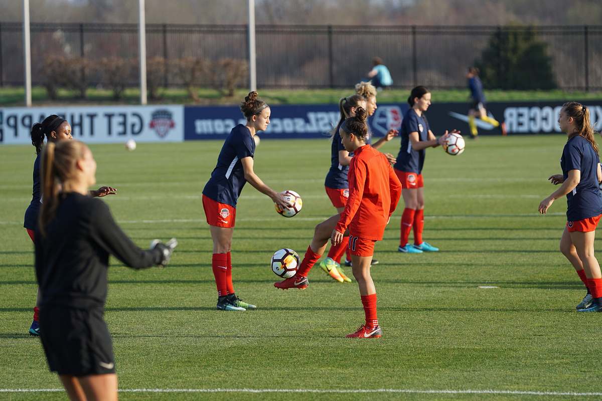 person group of women playing football people
