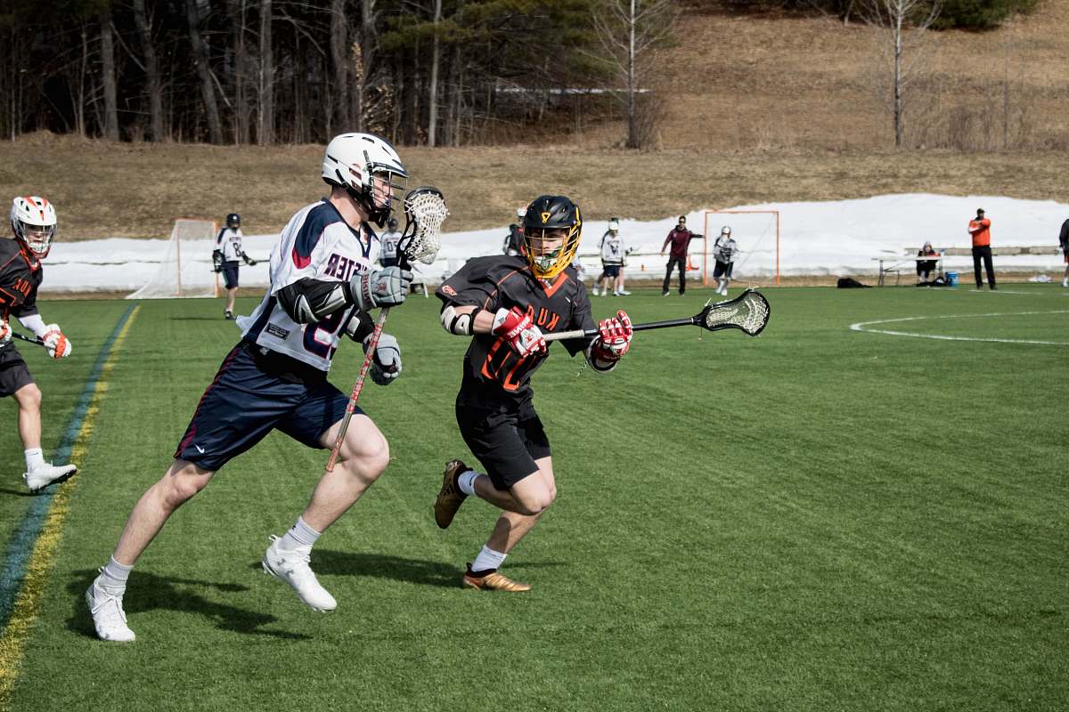 person lacrosse players on sports field people