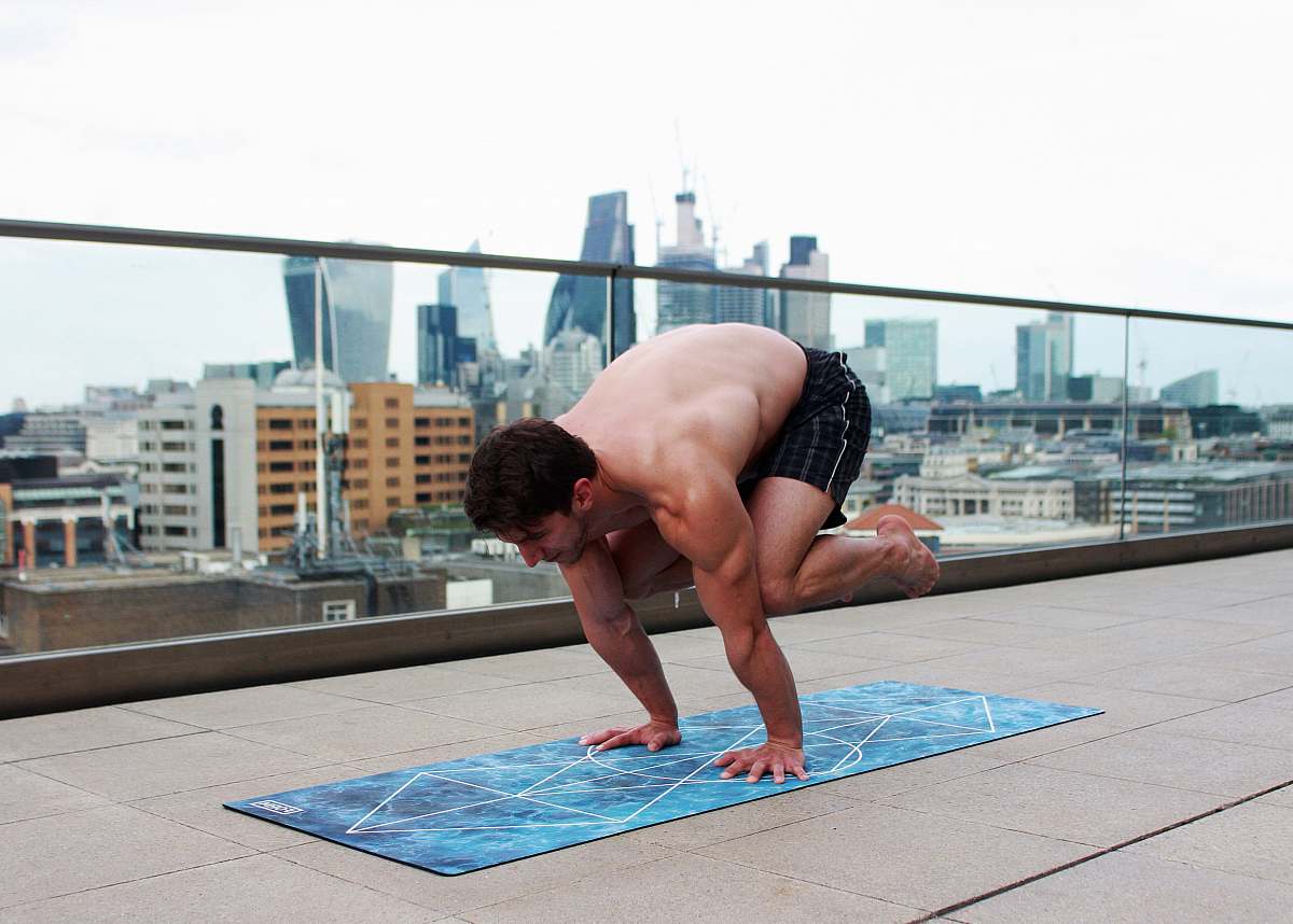person man doing yoga on terrace people