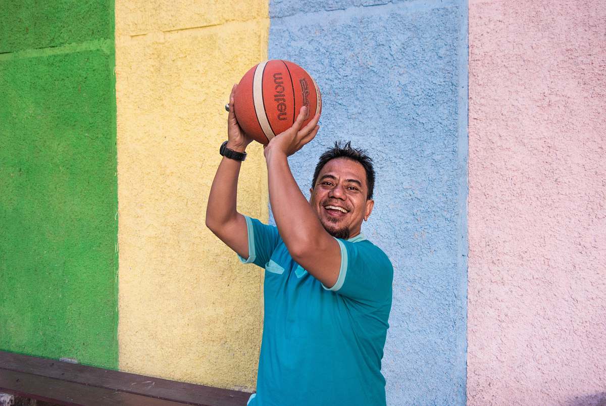 person man holding the ball photograph ball