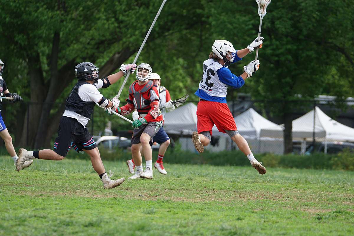 apparel man playing lacrosse clothing