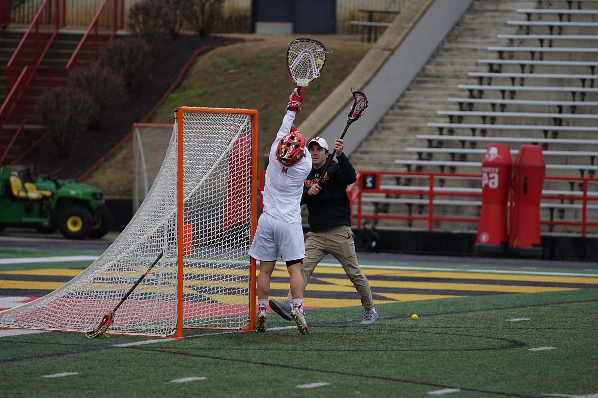 person man playing lacrosse sport