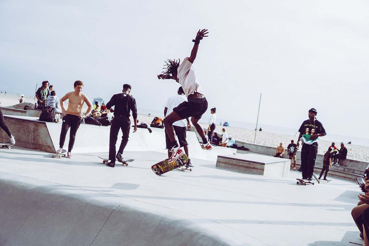 person man riding on skateboard sport