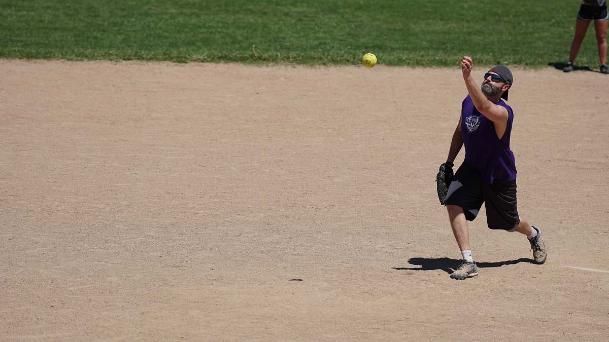 apparel man throwing baseball person