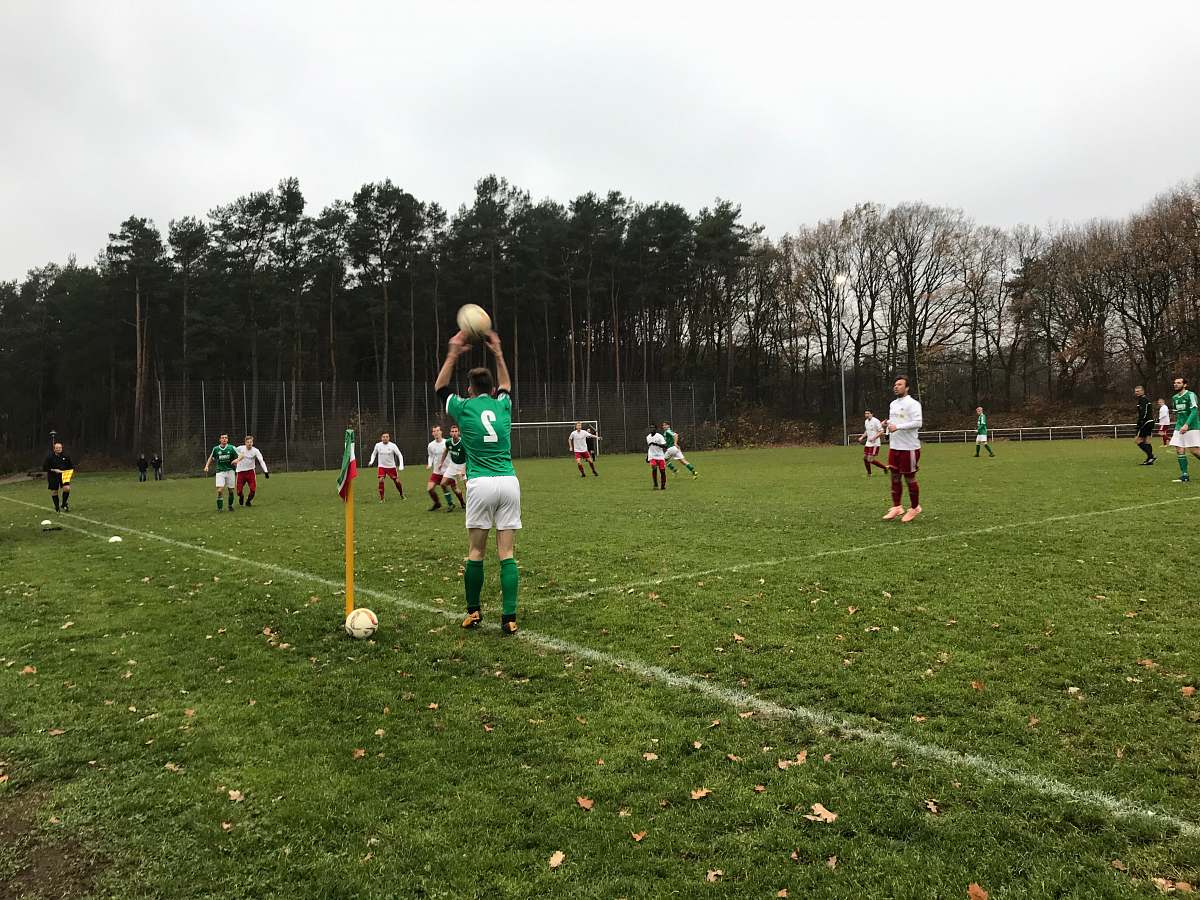 person man throwing soccer ball from the line people