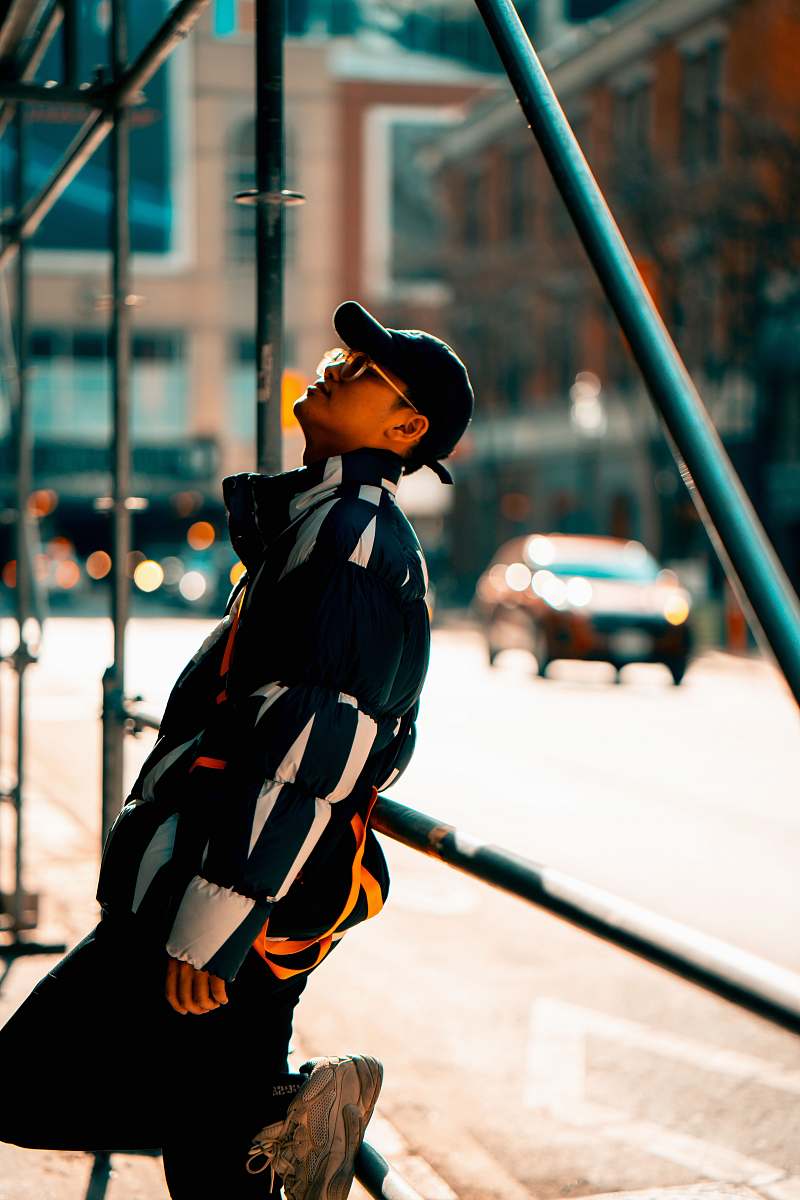 person man wearing black hat apparel