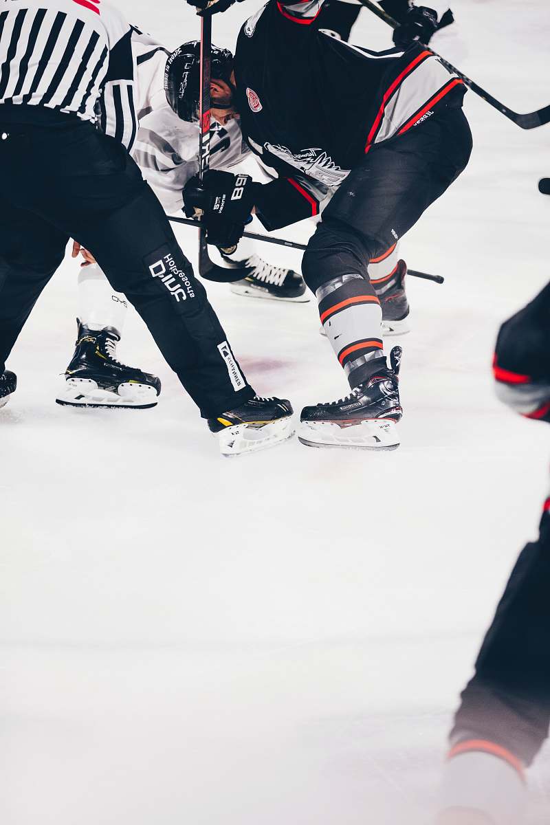 person men playing hockey helmet