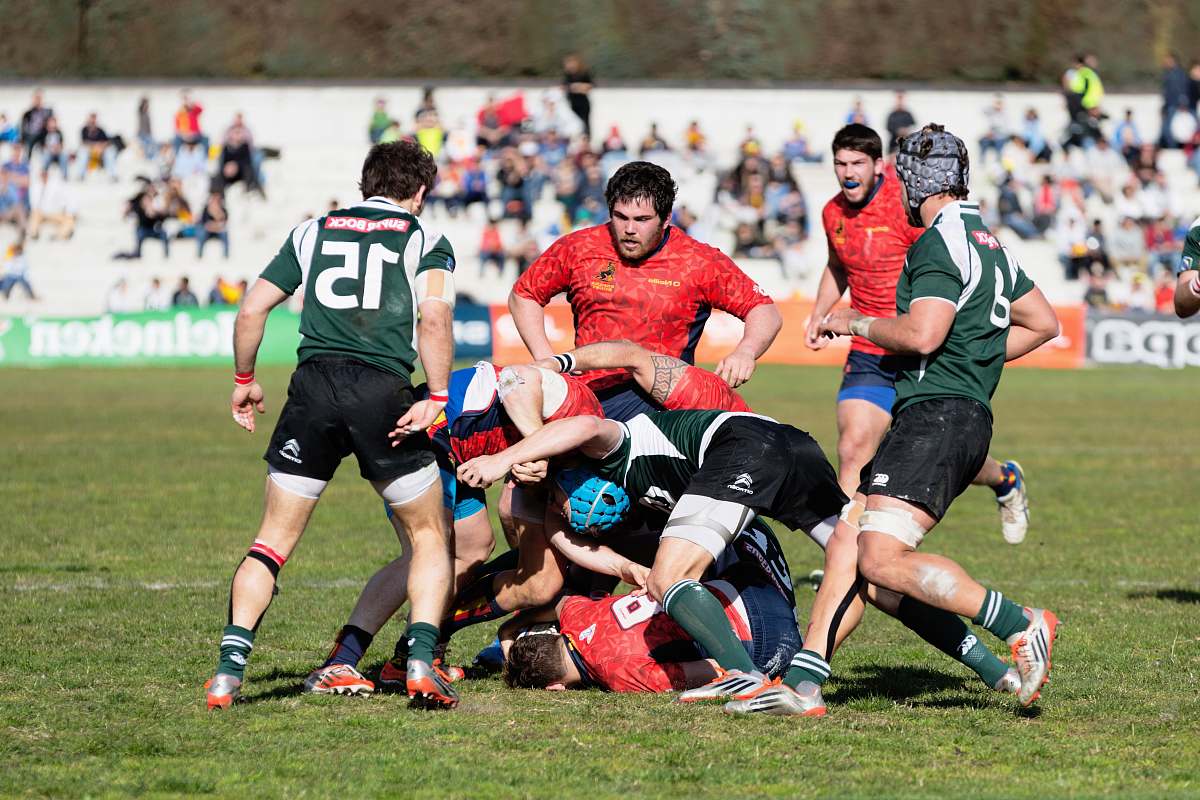 people men playing rugby football person