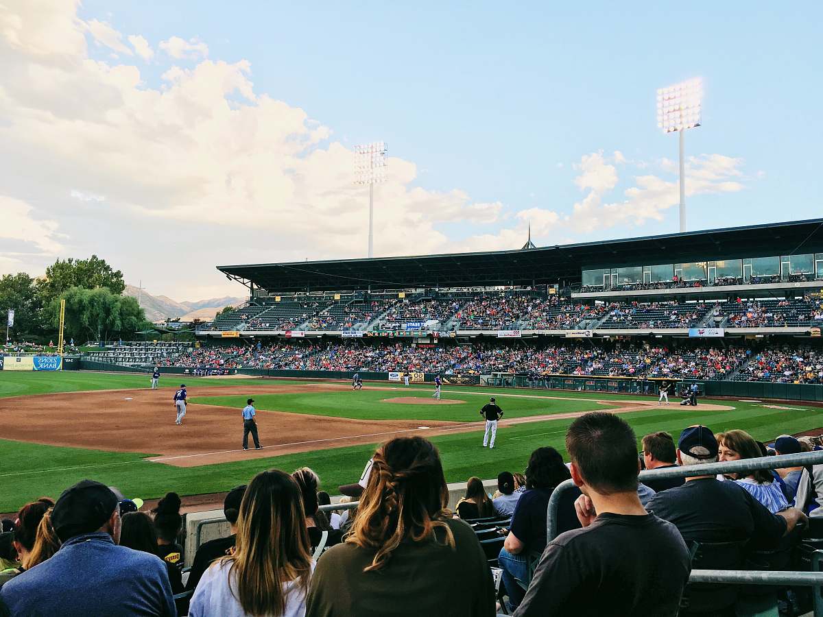 person people playing baseball during daytime people