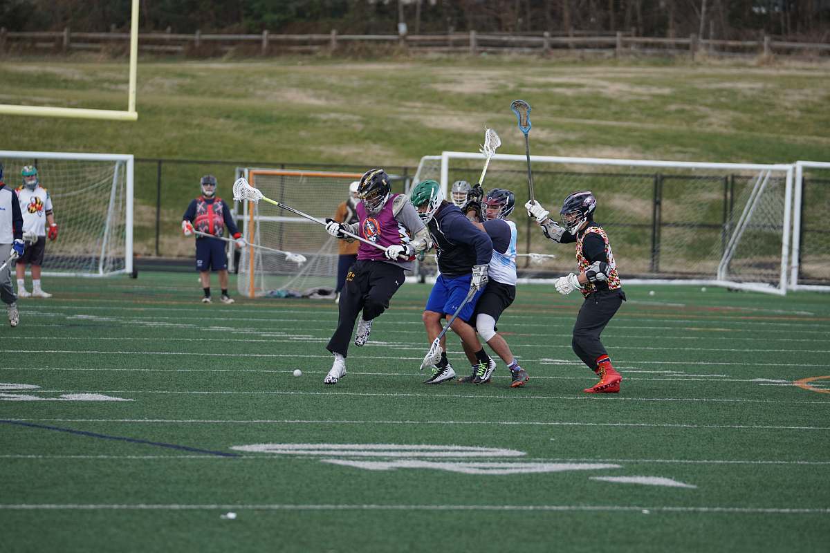 person people playing hockey american football