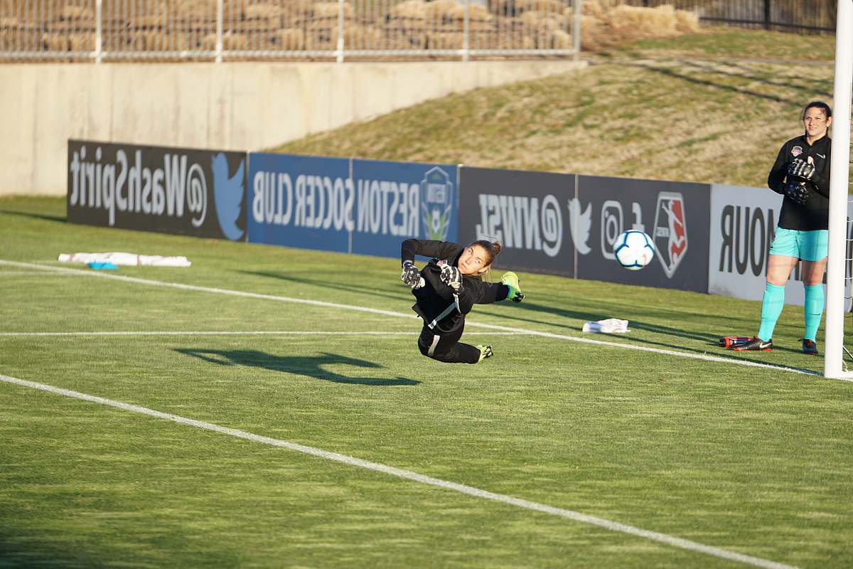 person person in black standing beside field field