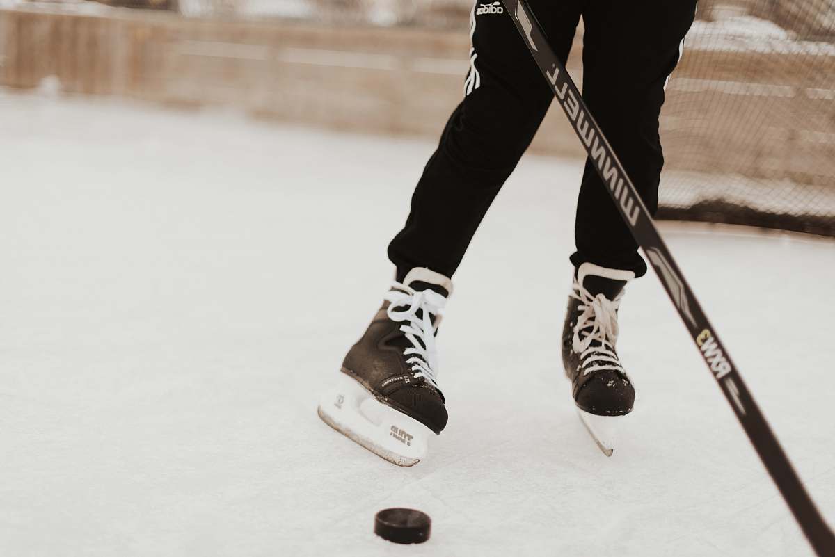 person person playing hockey apparel
