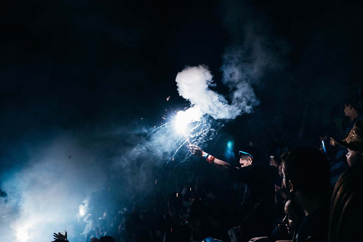 person person playing with fireworks people