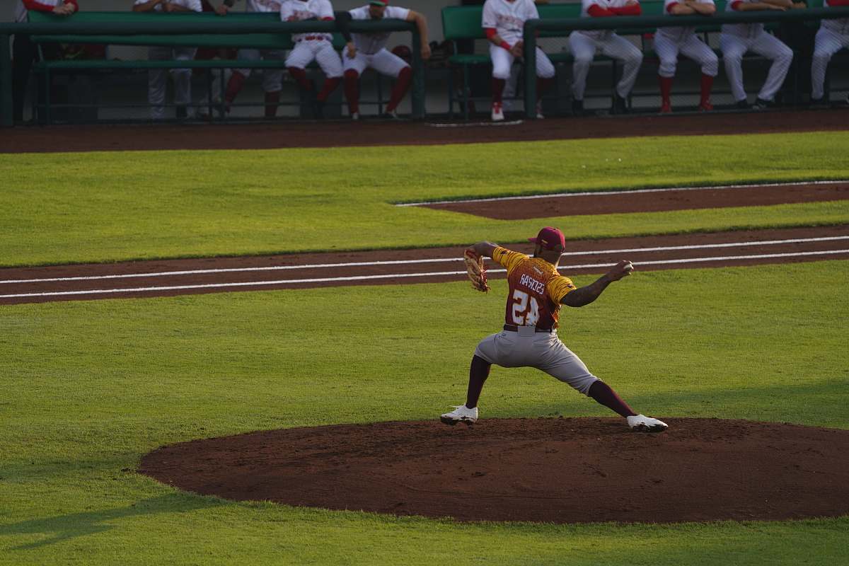 person pitcher on mound building