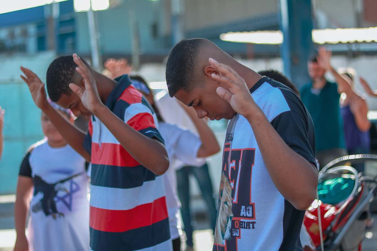 person selective focus photography of people praying people