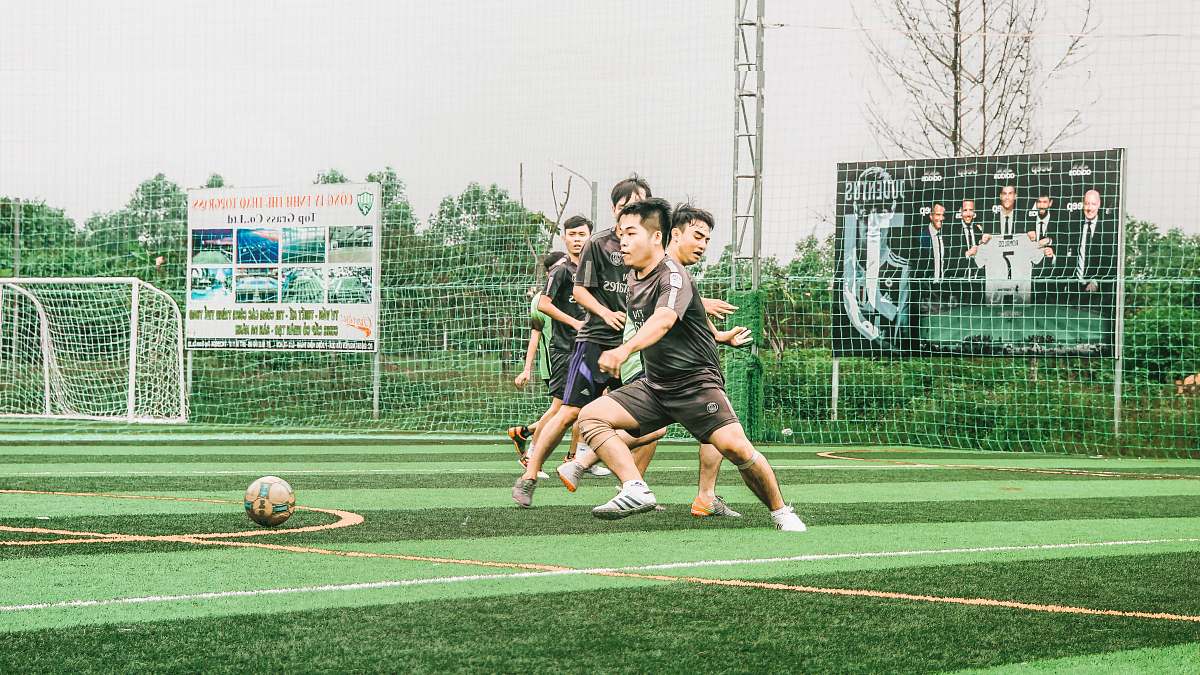 person team practicing soccer football