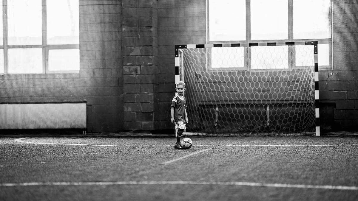football toddler playing soccer black-and-white