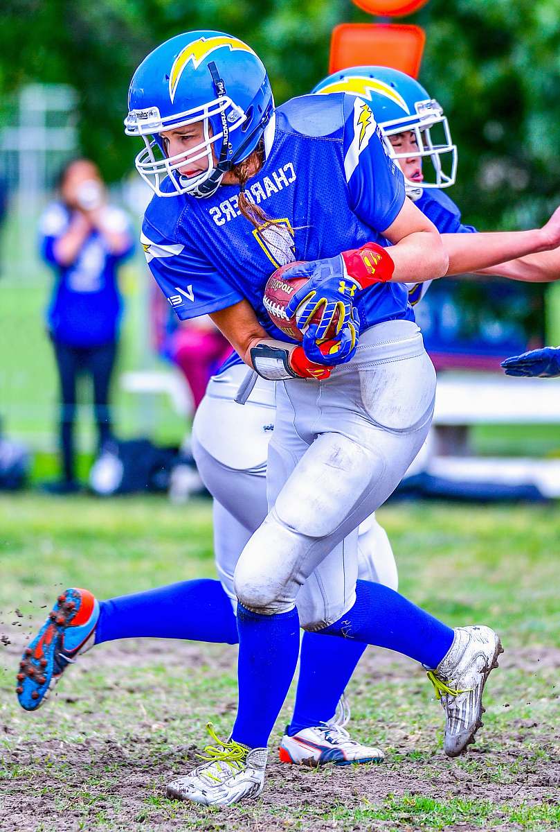 person woman playing football people
