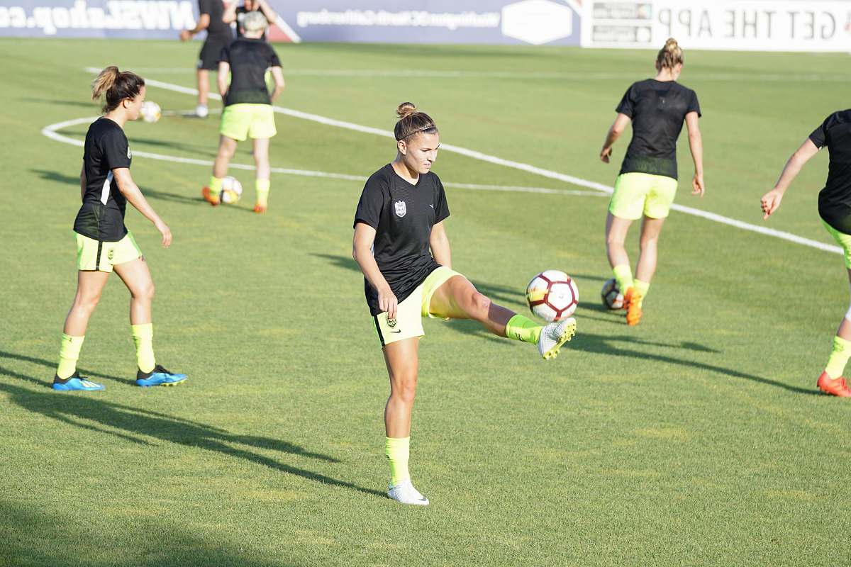 person woman playing soccer people