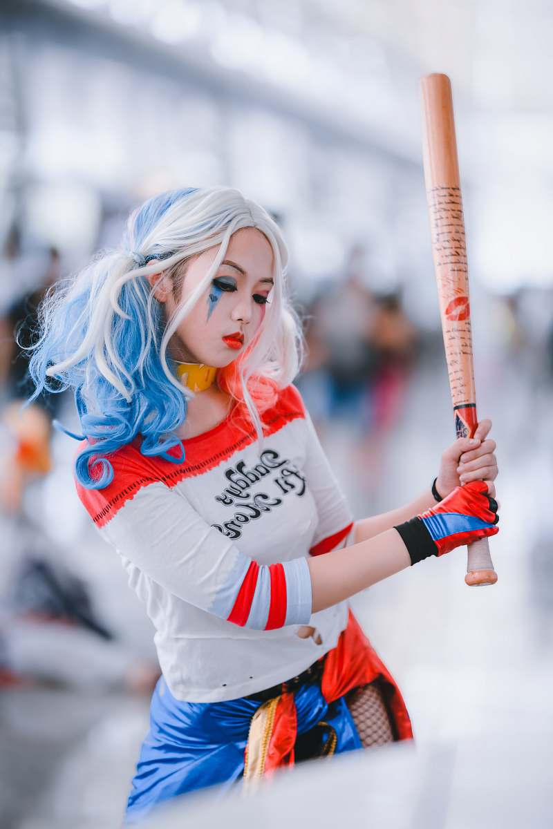 person woman wearing harley quinn costume costume
