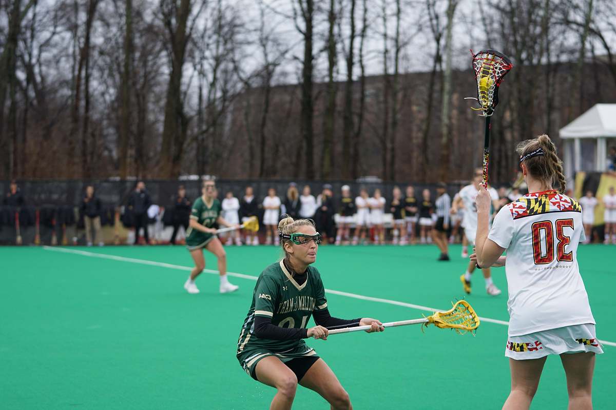 person women playing lacrosse people