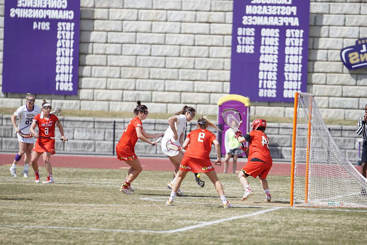 person women playing lacrosse sport people