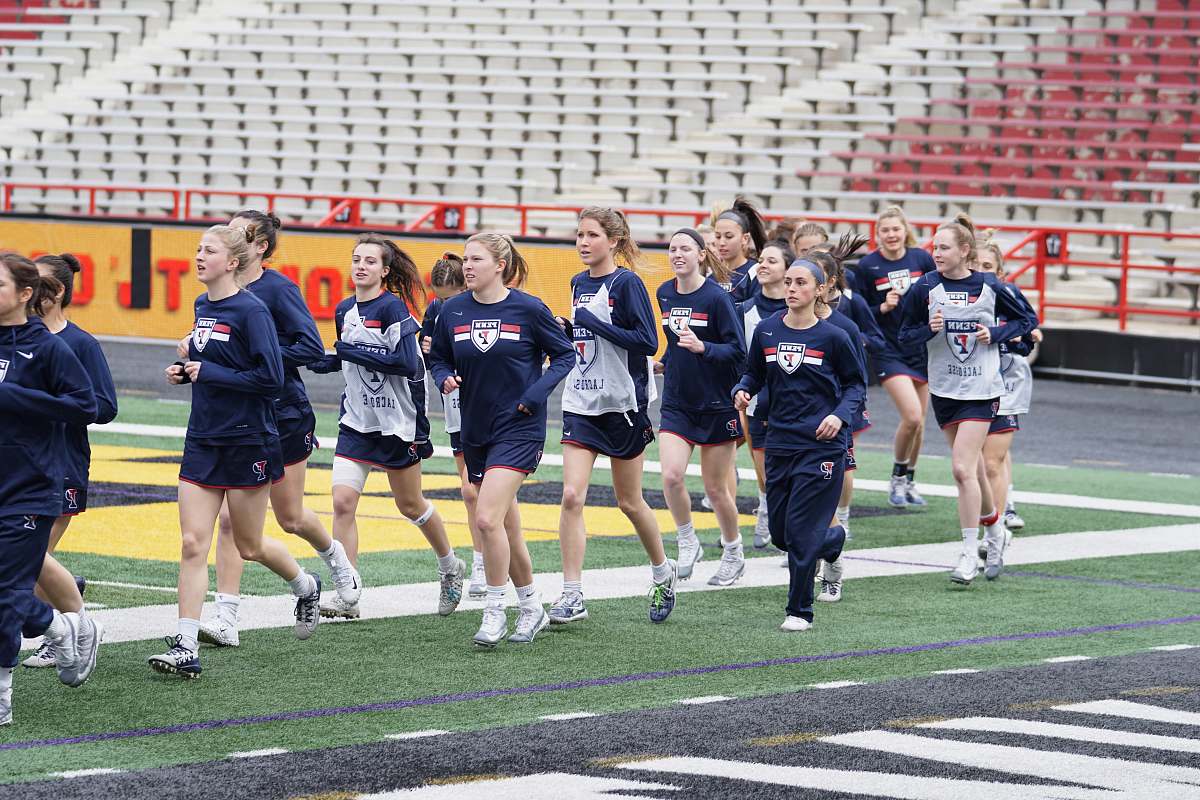 person women running on field at daytime people