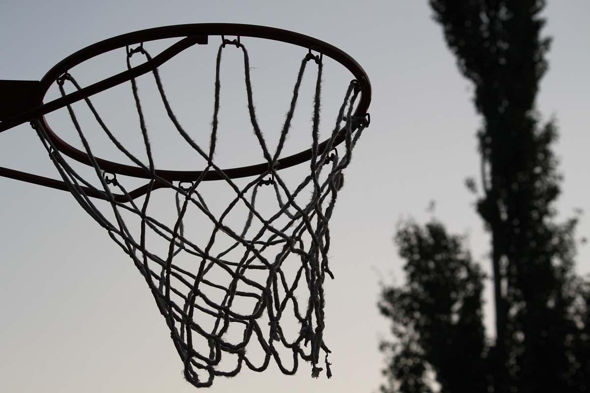hoop selective focus photography of basketball hoop grey