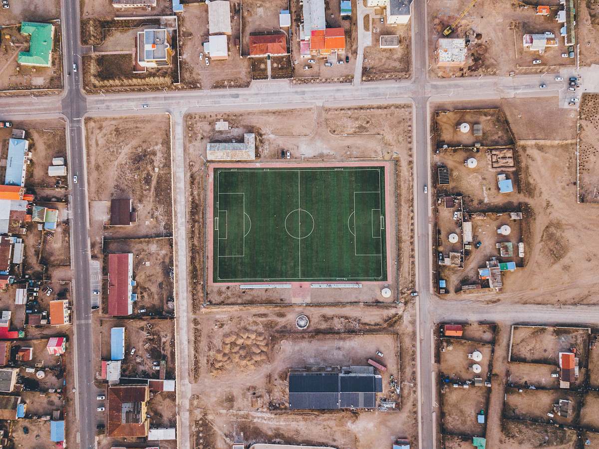 nature aerial view photography of soccer field outdoors