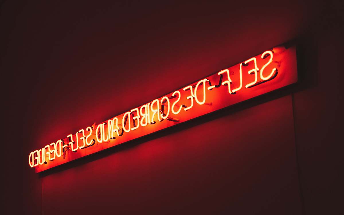 neon red self-described and self-defined LED sign baseball