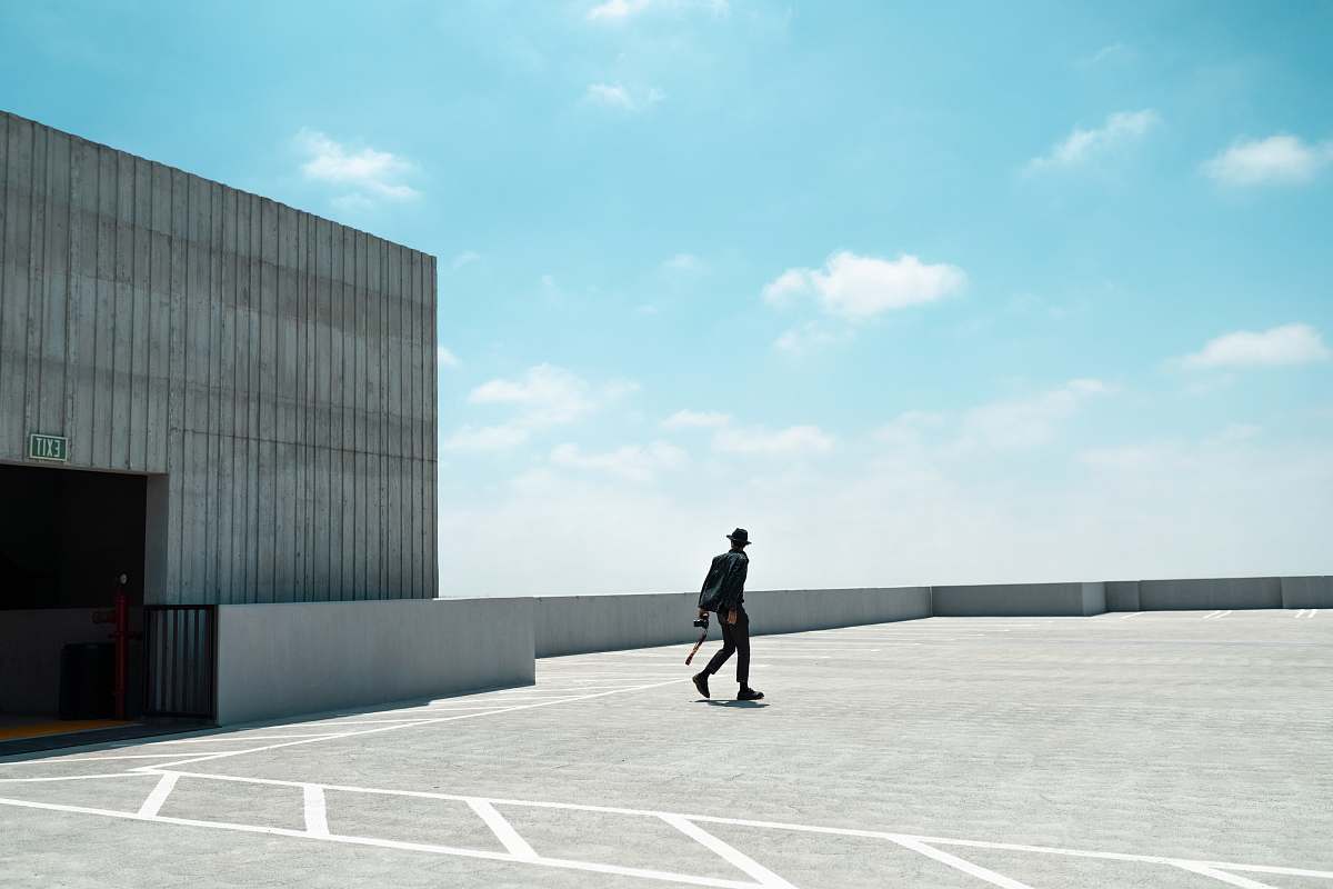 human person walking on rooftop person
