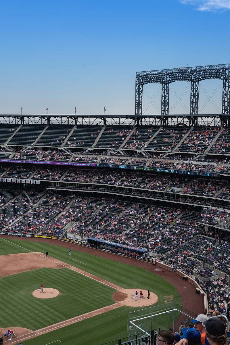 human view of baseball field under clear sky building