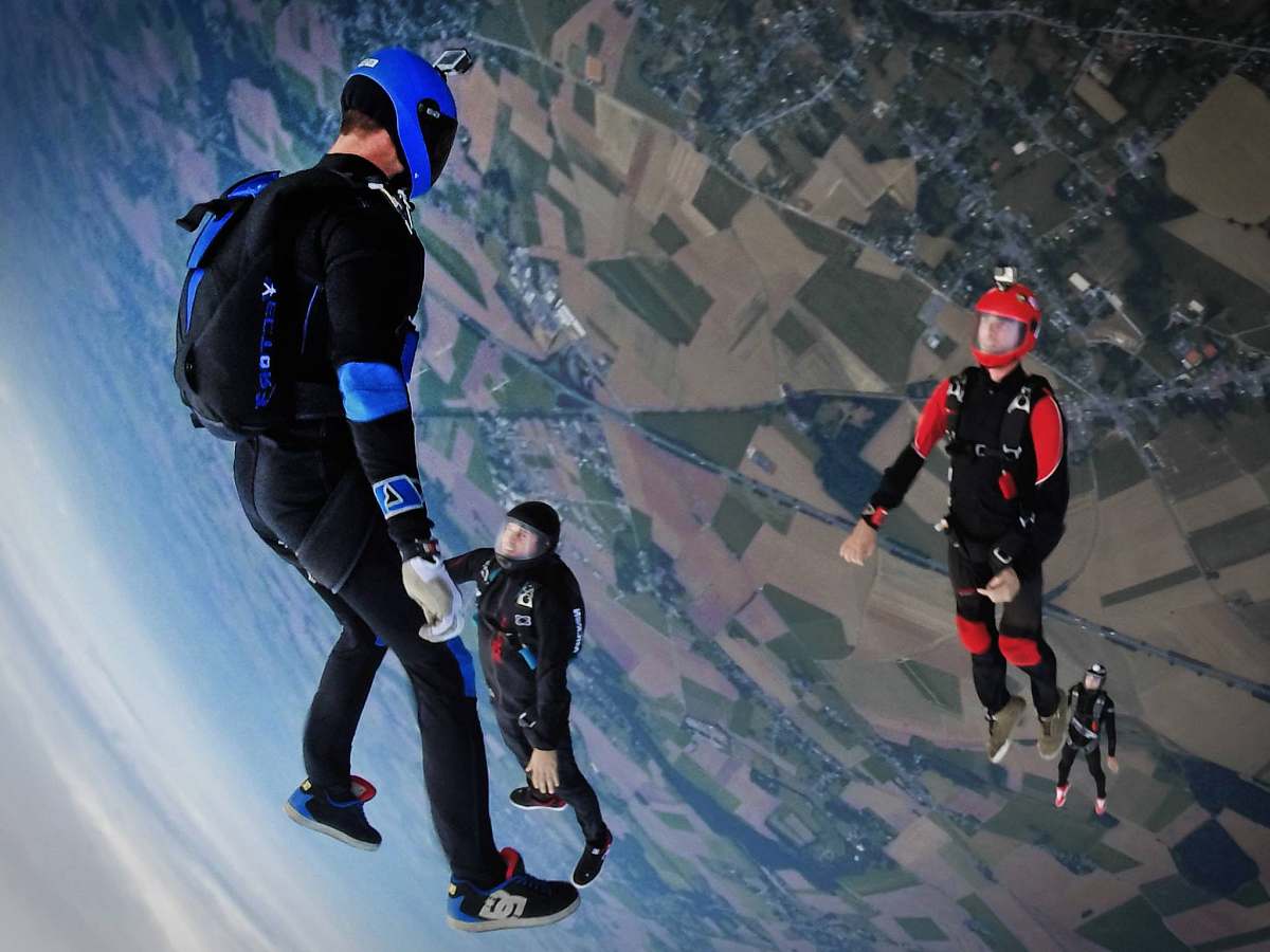 sport aerial photography of three people skydiving sports