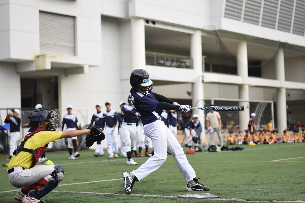 human baseball players playing baseball on baseball field people